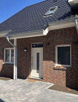 Vermietung: Erstbezug, moderne Erdgeschosswohnung mit Terrasse und Carport in Westoverledingen - Westoverledingen