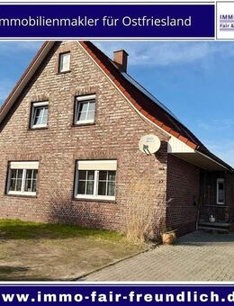 Einfamilienhaus mit Kaminofen, großem Grundstück und Doppelgarage in Aurich Egels - Aurich