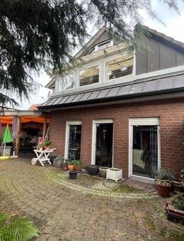 Wohn- und Geschäftshaus mit zwei Garagen - Rheine