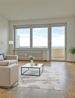 Behagliche 3 Zimmer-Wohnung mit Süd-Balkon und Einzelgarage in zentraler Lage in Dachau - Dachau
