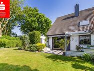 Bremen Woltmershausen: Charmante Doppelhaushälfte mit sonnigem Garten und Garage - Bremen