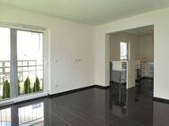 AUMÜLLER-Immobilien - Attraktive 2-Zi-Wohnung mit Fußbodenheizung, gepflegter EBK und modernem Bad - Wächtersbach