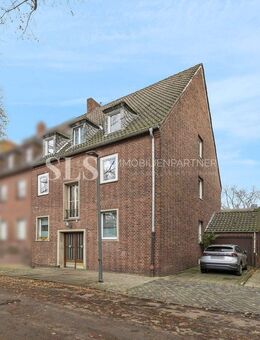 Zeitloses Dreifamilienhaus mit gepflegter Substanz und geschütztem Garten hinter dem Haus - Gelsenkirchen