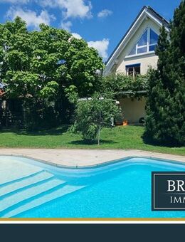 BRUMANI | Modernes Einfamilienhaus mit hochwertigem Anbau, Doppelgarage und Pool in Buggingen - Buggingen