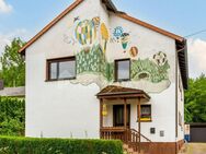 Ihr Traumhaus erwartet Sie: stilvolles Zweifamilienhaus mit Gartenparadies und Pool - Neunkirchen (Saarland)