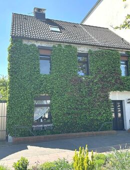 PURNHAGEN-IMMOBILIEN - Gepflegtes Einfamilienhaus mit zwei Terrassen in zentraler Lage von Vegesack - Bremen