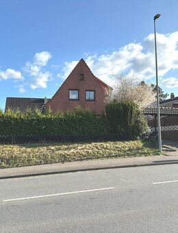 PURNHAGEN-IMMOBILIEN - Teil vermietetes 3-Parteienhaus mit Garage in zentraler Lage von Ritterhude - Ritterhude