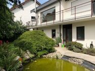 UG Wohnung mit großer Terrasse, Garten und Teich. - Neckartailfingen