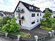 Gepflegtes Drei- bis Vierfamilienhaus mit 3 Garagen als Renditeobjekt - Friedrichsthal (Saarland)