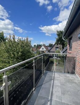 Verkauft! Schicke Neubau-Wohnung mit Balkon, Terrasse & Gartenanteil in Bookholzberg - Ganderkesee