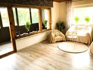 3,5 Zimmerwohnung mit Wintergarten und eigenem Garten mit Terrasse in Südseite! - Birenbach