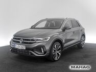 VW T-Roc, 2.0 TSI R-Line IQ DrivePACK NaviPro IQ Light Alu19MisanoBLACK, Jahr 2024 - München