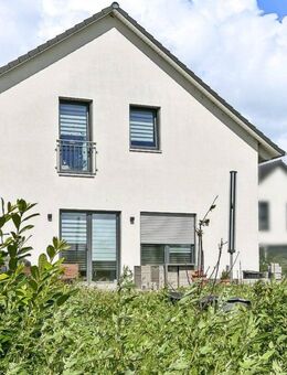 Modernes Familienglück im Grünen - energieeffizientes Einfamilienhaus mit viel Platz in Tessin - Tessin