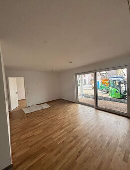 *ERSTBEZUG* Moderne 4-Zimmer-Wohnung in zentraler Lage mit großem Gartenanteil - Weil (Rhein)