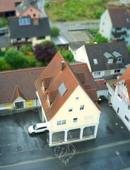 Wohn- und Geschäftsanwesen mit 12 Wohnungen + 1.175m² Gewerbefläche in direkter Nähe zu Würzburg - Reichenberg (Bayern)