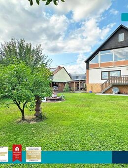 Schillingen: Charmantes Einfamilienhaus mit schönem Garten, Doppelgarage und Carport - Schillingen