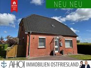 Teilmodernisiertes Einfamilienhaus mit Charakter und großem Grundstück - Krummhörn