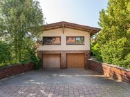 Doppelgarage mit Singlewohnung und Erweiterungspotential - Feucht