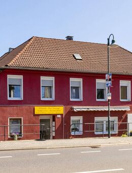 Rösrath: Gepflegtes und teilsaniertes Wohn- und Geschäftshaus mitten im Zentrum! - Rösrath