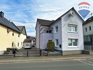Einfamilienhaus mit Einbauküche, Garage und kleinem Garten in Beselich - Beselich