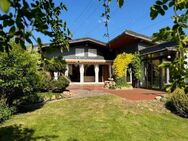 Großzügiger Bungalow mit Wintergarten, Außenkamin und nicht einsehbarem Grundstück in Bad Zwischenahn. - Bad Zwischenahn