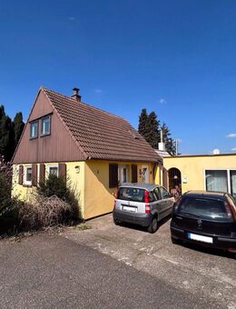 Sanierungsbedürftiges Einfamilienhaus mit gewerblichem Anbau - Pirmasens