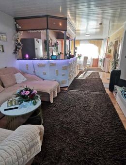 Gepflegte Erdgeschosswohnung mit Terrasse und Garage in ruhiger Lage von Mandel - Mandel