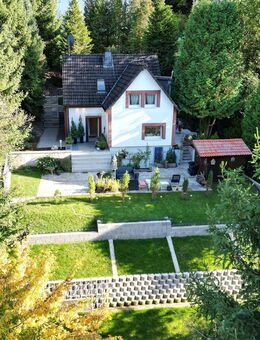 SCHADE IMMOBILIEN - Modernisiertes Einfamilienhaus mit uneinsehbarem Gartengrundstück. - Plettenberg