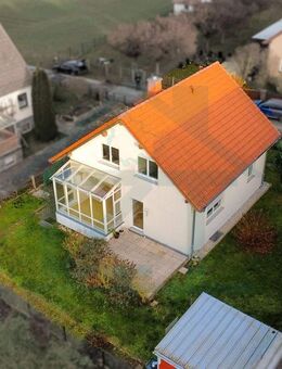 Familienglück mit Weitblick: Großzügiges Haus mit Wintergarten und sonnigem Garten - Reinstädt