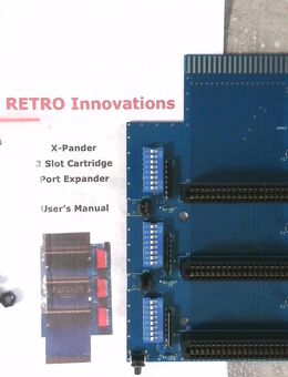 Commodore 64 / 128 X-Pander-3 Adapter für 3 Cartridge mit Handbuch und Halterung. - Witten
