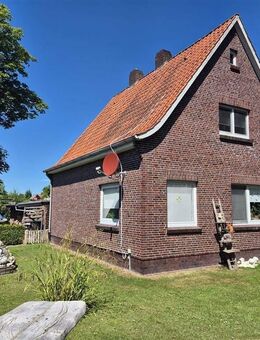 Solider Klinkerbau mit großem Grundstück in ruhiger Wohnlage der Stadt Jever - Jever