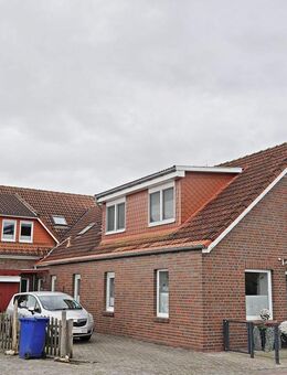 Modernes, gut vermietetes Sechsfamilienhaus sowie geräumige Lagerfläche im Ortskern von Werdum. - Werdum