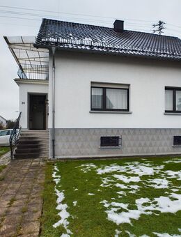Grundstück mit Zweifamilienhaus wartet auf Sie - Weiskirchen