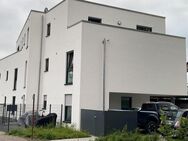 Zentrale Neubau EG-Wohnung mit Terrasse & kleinem Garten - Neuenkirchen (Nordrhein-Westfalen)