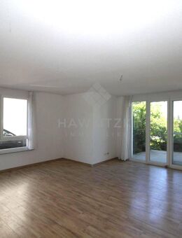 Moderne Maisonette-Wohnung mit herrlichem Blick ins Grüne, inkl. KfZ-Stellplatz (KfW-70-Haus). - Rheinstetten