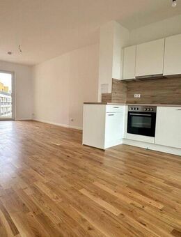 Helle 2-Zimmer-Wohnung im Erstbezug mit EBK, Tageslichtbad mit Wanne und Balkon - Leipzig