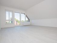 Helle Dachgeschosswohnung mit Balkon im Ortskern von Kleinenbroich - Korschenbroich