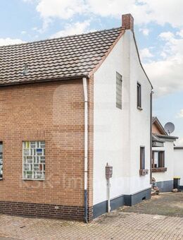 HandwerkerInnen aufgepasst! Einfamilienhaus mit Nebengebäude und großem Garten in ruhiger Lage. - Hürth