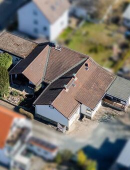 2 Wohneinheiten (WEG geteilt) im Bungalowstil zusammenhängend mit großer Wohnfläche - Rüsselsheim