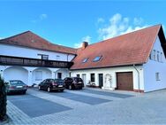 Interessantes Mehrfamilienwohnhaus mit Gewerbetrakt in Stemwede - Stemwede