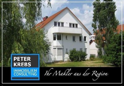 Attraktive, vermietete Dachgeschoss-Wohnung mit Balkon und Stellplatz