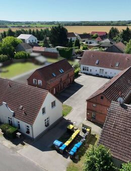 Modernisierte Wohnanlage mit vier Gebäuden und zehn Wohneinheiten - gepflegt, voll vermietet und ruhig gelegen in Rat... - Rathenow