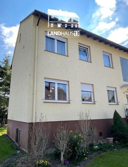 Zweifamilienhaus mit Entwicklungspotenzial . großem sonnigem Garten . Garage . Laubenheim - Mainz