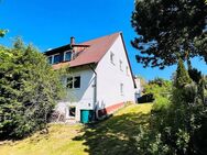 Charmantes Zweifamilienhaus mit idyllischem Garten in attraktiver Hanglage (Fernblick) - Markt Taschendorf