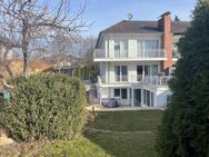 Wohnen in einer der besten Straßen Grünwalds! Ensemblehaus mit interessanter Gartenanlage - Grünwald
