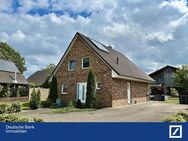 Neuwertiges Einfamilienhaus mit Gartenzauber - Lentföhrden