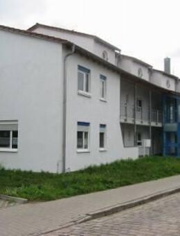 Traumhaft gelegene, großzügige und helle 2-Zimmer-Maisonette-Wohnung in exponierter Lage mit großem Sonnenbalkon - Coswig (Anhalt)
