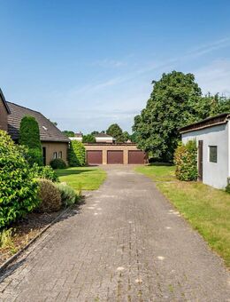 Viel Platz, noch mehr Potenzial: Gepflegtes Ein-/ Zweifamilienhaus mit Garagen und großzügigem Anbau - Bassum