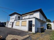 Attraktiver Bungalow mit Einliegerwohnung, großer Dachterrasse und Panoramablick. - Wahlrod