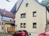 Einfamilienhaus in Wü/Versbach mit kleinem Garten, Sanierungsbedarf mit neuem Anbau - Würzburg